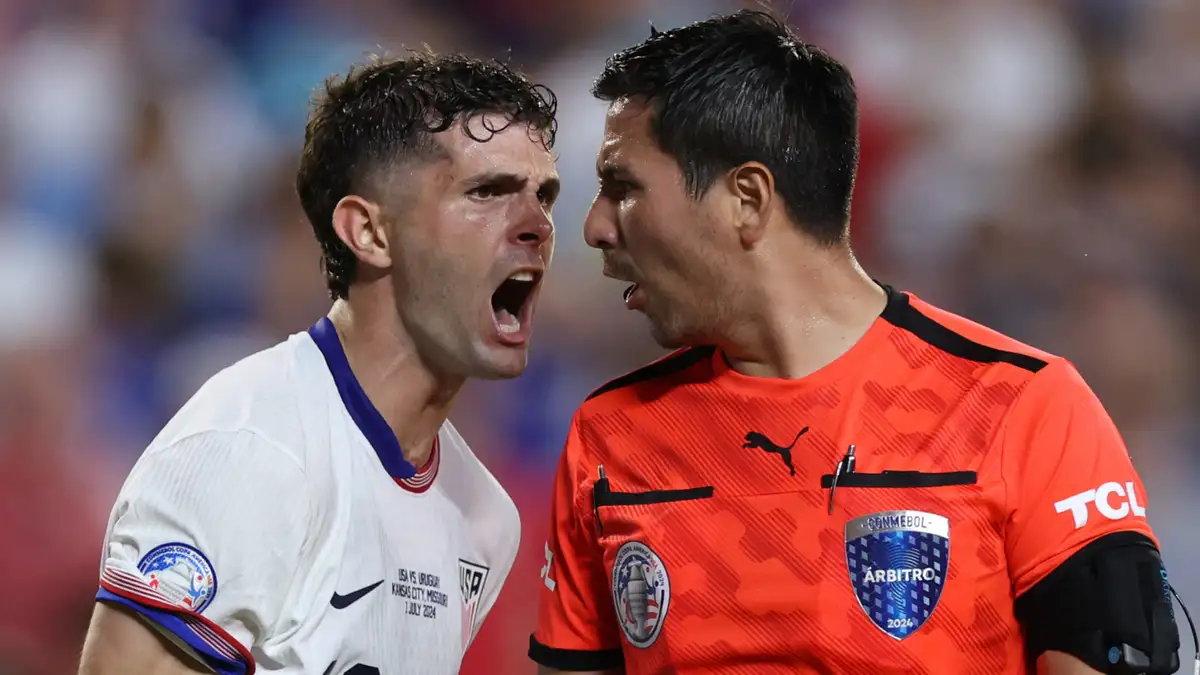 Christian Pulisic blows his top at Kevin Ortega as USMNT star 'can't accept' referee calls that went against Gregg Berhalter's side in controversial Copa America loss to Uruguay
